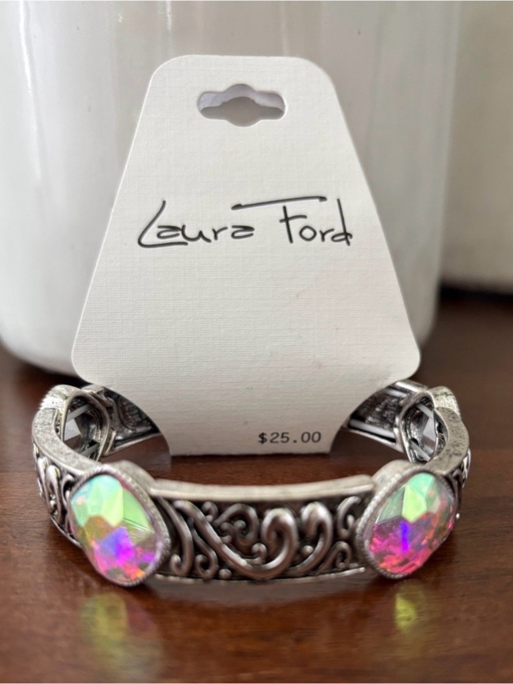 Laura  Ford silvertone  embossed,beveled iridescent stones,stretch bracelet